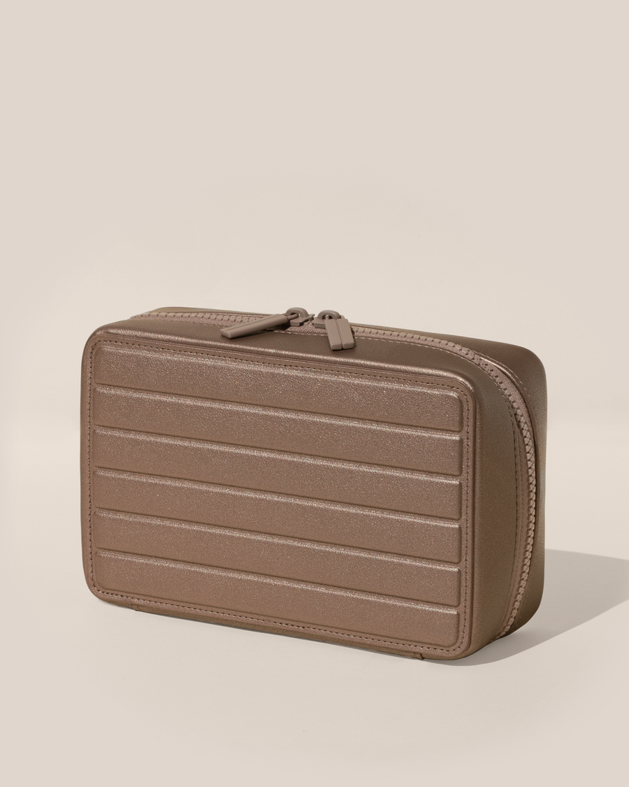 Closed Parallelle Bronze Vault jewelry case with a compact, zip-around design for elevated jewelry organization