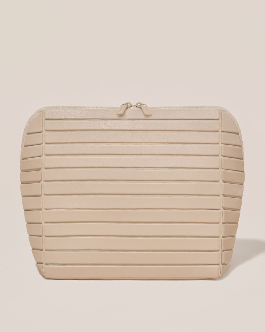 Closed Parallelle Large Bisque (white) Traveller makeup bag with structured horizontal bar design