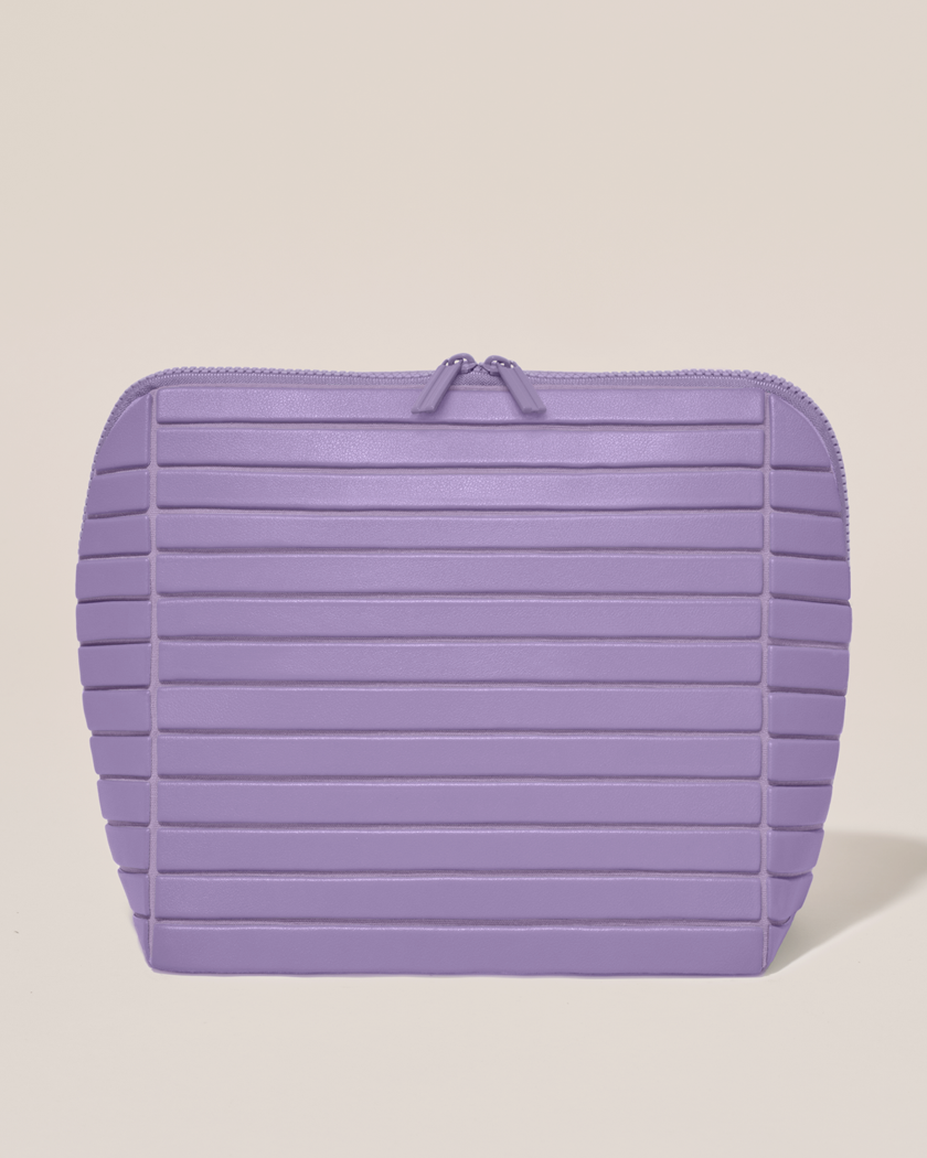 Closed Parallelle Large Lilac (purple) Traveller makeup bag with structured horizontal bar design