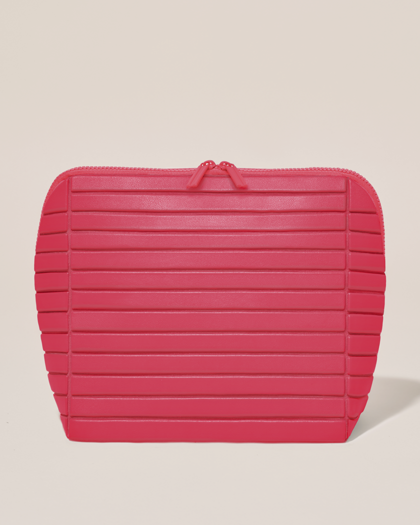Closed Parallelle Large Tart (hot pink) Traveller makeup bag with structured horizontal bar design