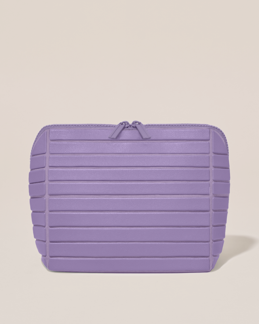 Closed Parallelle Medium Lilac (purple) Traveller makeup bag with structured horizontal bar design