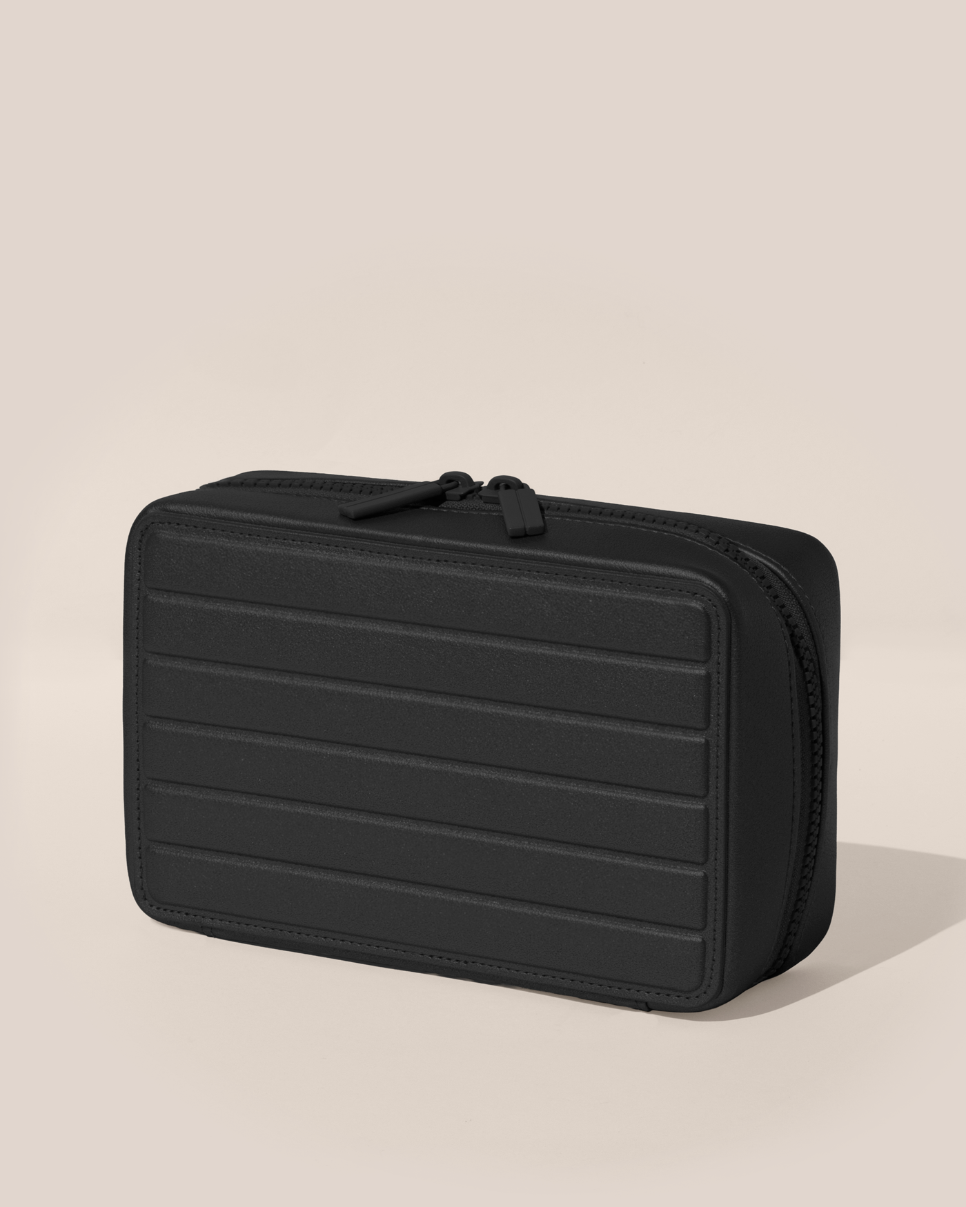 Closed Parallelle Onyx (Black) Vault jewelry case with a compact, zip-around design for elevated jewelry organization