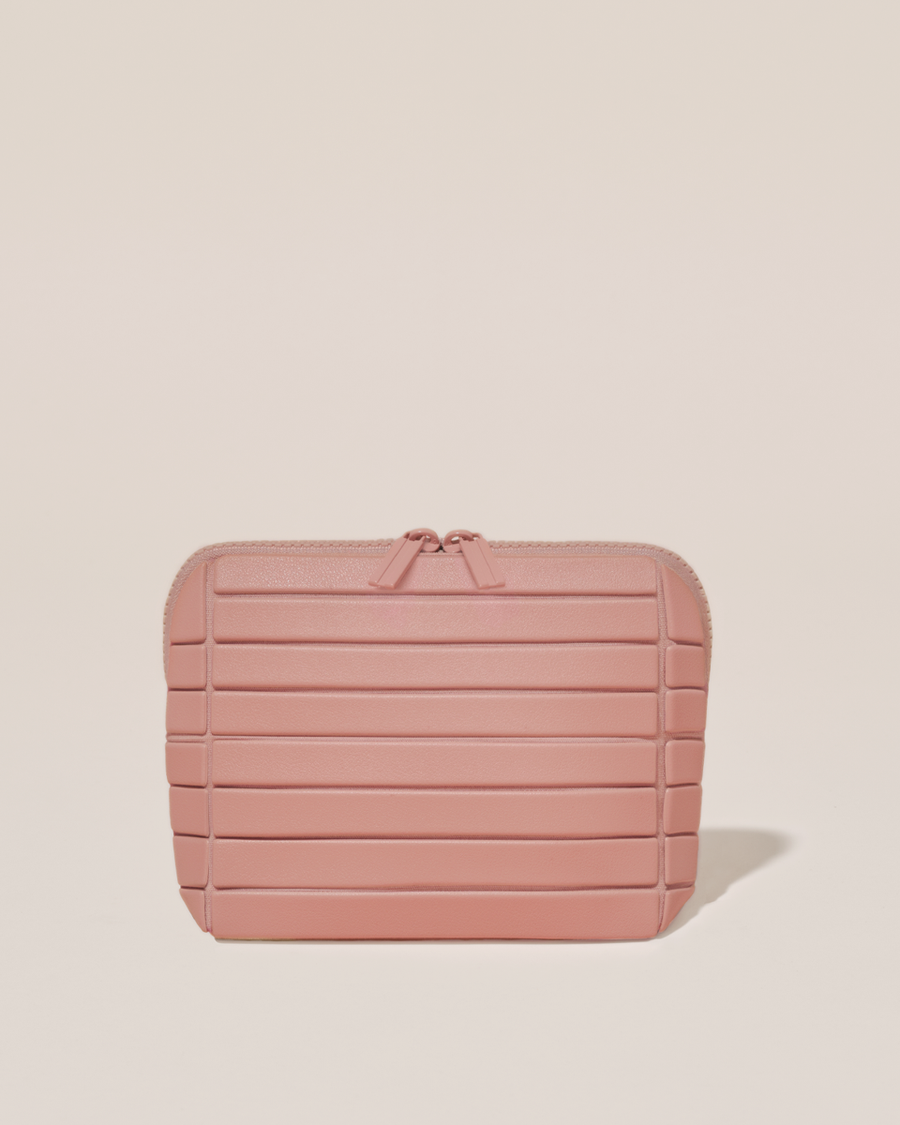 Closed Parallelle Small Blush (pink) Traveller makeup bag with structured horizontal bar design