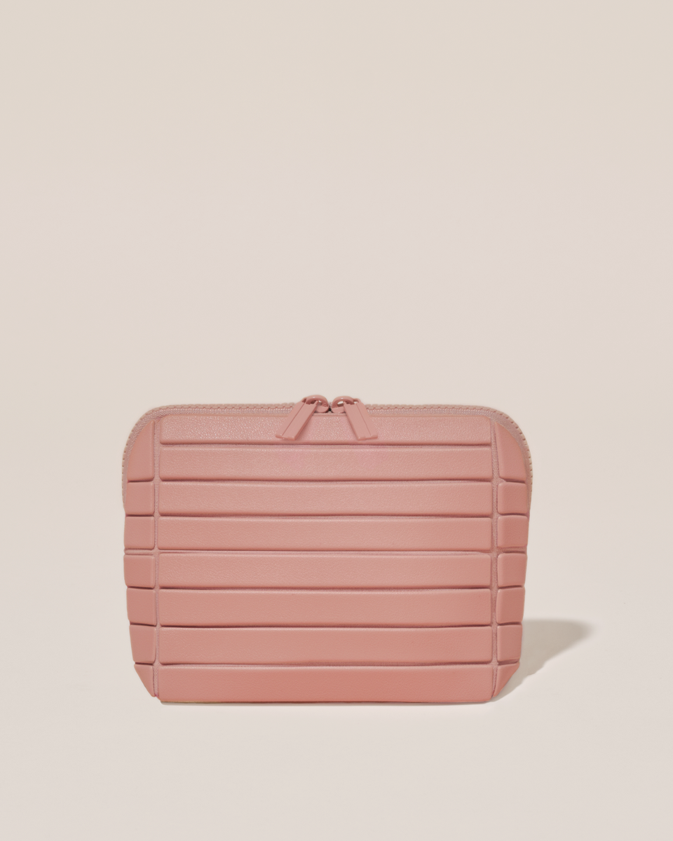 Closed Parallelle Small Blush (pink) Traveller makeup bag with structured horizontal bar design