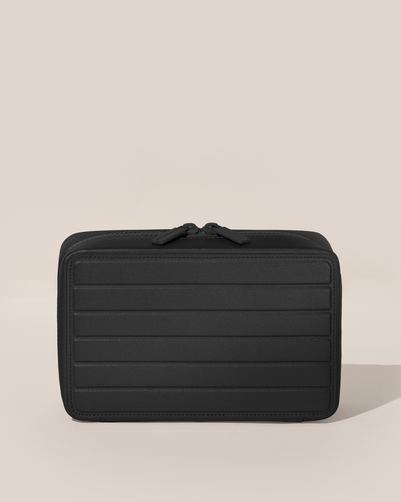 Closed Parallelle Onyx (Black) Vault jewelry case with a compact, zip-around design for elevated jewelry organization